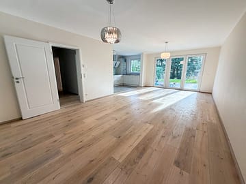 Terrassenwohnung mit Garten – Ihr Rückzugsort in Bredeney - Wohnzimmer